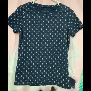 Blue t-shirt with white flowers